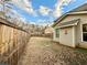 Backyard featuring lawn area with wood fence, neutral siding at 4188 Gunnerson Ln, Kennesaw, GA 30152