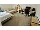 Bedroom with a workspace that includes 2 desks, shelves, and seating at 4188 Gunnerson Ln, Kennesaw, GA 30152