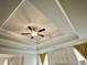 Tray ceiling with fan in main bedroom offers style and comfort at 4188 Gunnerson Ln, Kennesaw, GA 30152