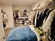 Walk-in closet with ample storage space and clothing racks at 4188 Gunnerson Ln, Kennesaw, GA 30152