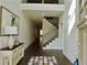 Welcoming foyer featuring a view of the staircase and an elegant console table at 4188 Gunnerson Ln, Kennesaw, GA 30152