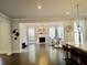 Open floor plan living room and kitchen area with modern finishes and natural light at 4188 Gunnerson Ln, Kennesaw, GA 30152