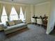 Upstairs sitting room with lots of natural light is perfect for an office space at 4188 Gunnerson Ln, Kennesaw, GA 30152