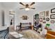 Bright Bedroom with crib, decor, and transition to the rest of the house at 5835 Sterling Ct, Cumming, GA 30040
