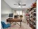 Office space with a modern desk, comfortable seating, and ample shelving for storage and display at 5835 Sterling Ct, Cumming, GA 30040