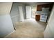 Cozy kitchen with wooden cabinets, white appliances, and door leading to fenced outdoor space at 2660 Evans Mill Dr, Lithonia, GA 30058