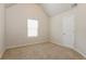 Bright bedroom featuring carpet floors, neutral walls and a window providing natural light at 4924 Rapahoe Trl, Atlanta, GA 30349