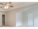 Bright bedroom featuring neutral walls and a ceiling fan at 4924 Rapahoe Trl, Atlanta, GA 30349