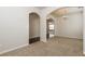 Open-concept dining room featuring neutral walls and plush carpeting at 4924 Rapahoe Trl, Atlanta, GA 30349