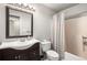 Well-lit bathroom with a classic vanity, toilet, and shower-tub combination at 1255 Wildcliff Ne Pkwy, Atlanta, GA 30329