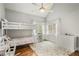 Bedroom with vaulted ceilings, hardwood floors, and natural light from ample windows at 1255 Wildcliff Ne Pkwy, Atlanta, GA 30329