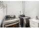 Functional laundry room with modern washer, dryer, and utility sink at 1255 Wildcliff Ne Pkwy, Atlanta, GA 30329