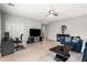 Open living room with a ceiling fan, modern decor, and comfortable seating arrangement at 1255 Wildcliff Ne Pkwy, Atlanta, GA 30329