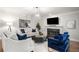 Bright living room with a fireplace, hardwood floors, and stylish, comfortable seating at 1255 Wildcliff Ne Pkwy, Atlanta, GA 30329