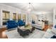 Comfortable living area with modern furniture, hardwood floors, and natural light from large windows at 1255 Wildcliff Ne Pkwy, Atlanta, GA 30329