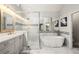 Modern bathroom featuring large walk-in shower and separate soaking tub at 1255 Wildcliff Ne Pkwy, Atlanta, GA 30329