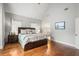 Vaulted ceiling in main bedroom with hardwood floors and ensuite bathroom at 1255 Wildcliff Ne Pkwy, Atlanta, GA 30329