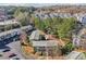 Aerial view showcasing property's location in a tree-filled neighborhood with parking lot at 3048 Briarcliff Ne Rd # 2, Atlanta, GA 30329