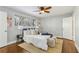 Bright bedroom with hardwood floors, a ceiling fan, and stylish decor at 3048 Briarcliff Ne Rd # 2, Atlanta, GA 30329