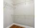 Walk-in closet with built-in metal shelving and hardwood floors at 3048 Briarcliff Ne Rd # 2, Atlanta, GA 30329