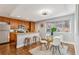 Well-equipped kitchen with granite countertops, stainless steel appliances, and a dining area at 3048 Briarcliff Ne Rd # 2, Atlanta, GA 30329