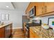 Kitchen featuring stainless steel appliances, granite countertops, and hardwood floors at 3048 Briarcliff Ne Rd # 2, Atlanta, GA 30329