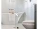 Bright bathroom featuring a freestanding tub, glass shower, and modern fixtures, designed for relaxation at 3637 Eaglerock Dr, Atlanta, GA 30340