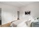 Bedroom with whitewashed ceiling beams, and a minimal design and decor at 3637 Eaglerock Dr, Atlanta, GA 30340