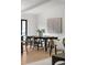 Open dining area with light wood floors, a large table and stylish decor at 3637 Eaglerock Dr, Atlanta, GA 30340