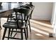 Close up of a modern dining table and chairs with hardwood floors at 3637 Eaglerock Dr, Atlanta, GA 30340