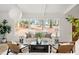 Cozy living room featuring a plush sofa, natural light, and stylish decor at 3637 Eaglerock Dr, Atlanta, GA 30340