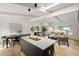 Open-concept living space with kitchen, dining area, and living room featuring lots of natural light at 3637 Eaglerock Dr, Atlanta, GA 30340