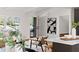 Open-concept living area with hardwood floors, natural light, and stylish furnishings at 3637 Eaglerock Dr, Atlanta, GA 30340