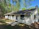 Backyard with white house at 1449 Albans Ct, Lithonia, GA 30058