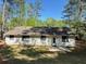 House backyard with a white fence at 1449 Albans Ct, Lithonia, GA 30058
