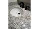 A close-up of a granite bathroom countertop with a black faucet at 1449 Albans Ct, Lithonia, GA 30058