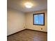 A bedroom featuring vinyl floors, a window, and neutral-colored walls at 1449 Albans Ct, Lithonia, GA 30058