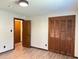 Spacious bedroom featuring closet and doorway at 1449 Albans Ct, Lithonia, GA 30058