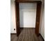 Open bifold closet doors revealing closet interior at 1449 Albans Ct, Lithonia, GA 30058