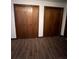 Traditional wood bedroom closets with wood-look flooring at 1449 Albans Ct, Lithonia, GA 30058