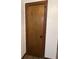 A closed wooden door with a dark frame at 1449 Albans Ct, Lithonia, GA 30058