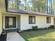 Beautiful front entrance with a stylish glass door, accentuating the home's curb appeal at 1449 Albans Ct, Lithonia, GA 30058