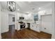 Updated kitchen featuring stainless steel appliances, granite counters, and white cabinets at 2595 Old Toney Rd, Ellenwood, GA 30294