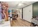 Spacious bedroom showcases wood floors, a closet, and colorful accents at 1610 Elm Ne St, Conyers, GA 30012