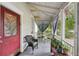 View of covered front porch with seating area and decorative accents at 1610 Elm Ne St, Conyers, GA 30012