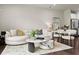 A spacious living room with hardwood floors and a white sofa at 2452 Coosa Vly, Atlanta, GA 30339
