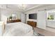 Serene main bedroom with a TV and attached bathroom at 2452 Coosa Vly, Atlanta, GA 30339