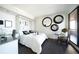 Stylish bedroom with dark floors, modern decor, and a bright open space at 75 14Th Ne St # 3820, Atlanta, GA 30309