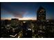 Stunning night view of the illuminated city skyline, showcasing vibrant urban living at 75 14Th Ne St # 3820, Atlanta, GA 30309