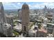 Stunning view of a high-rise building with unique architecture, nestled in a vibrant cityscape at 75 14Th Ne St # 3820, Atlanta, GA 30309